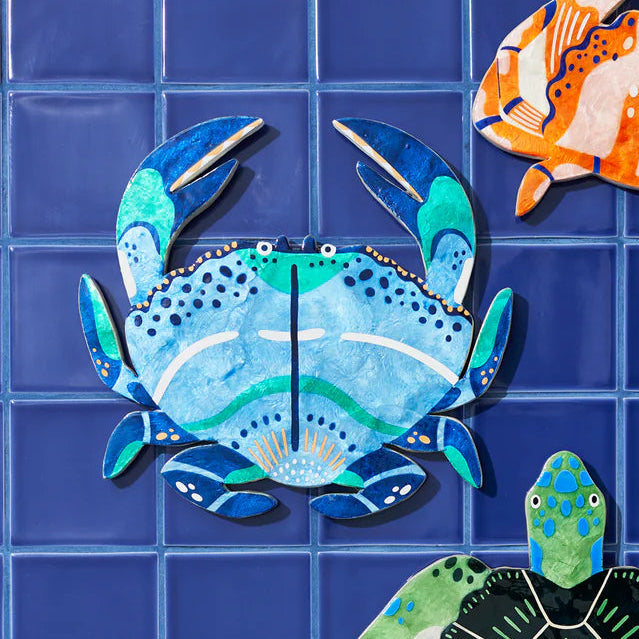 Jones and Co Capiz shell crab wall art in blues and greens